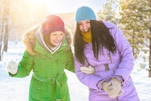 two women in snow